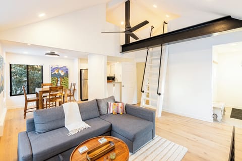 Living Room with Fireplace, Desk, Full-Size Sleeper Sofa, and Access to Loft