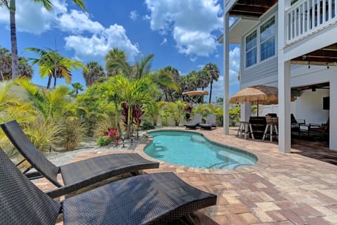 Lush tropical landscape surround the pool patio