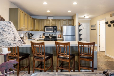 Kitchen and Condo Entrance