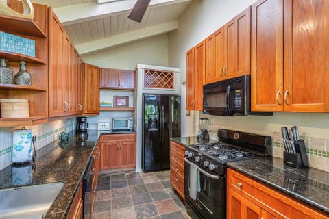 Kitchen is fully equipped with pots, pans & utensils