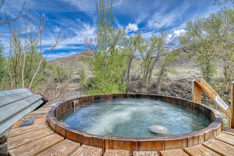 Soak and relax in the hot tub right on the banks of the Arkansas River!
