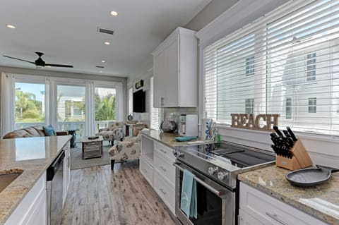 Kitchen and living room with tons of natural lighting