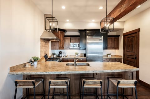 Modern kitchen with bar seating for 4