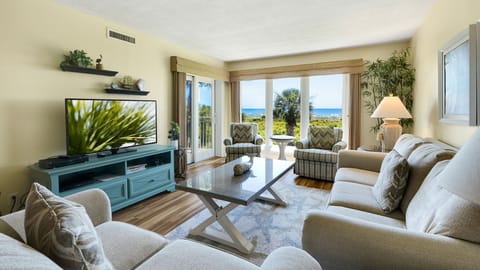 Living Room with Flat Screen TV and Ocean Views
