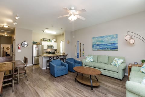 Settle into your spacious coastal retreat with ocean-inspired decor and modern comfort for your perfect beach getaway.