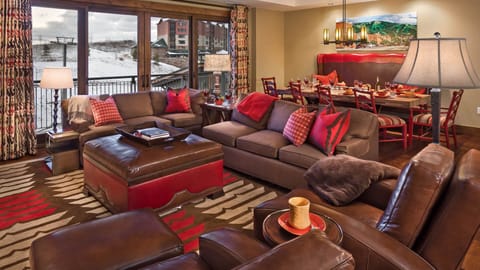 Great Room, Main Level - With fireplace and deck access