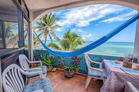 Balcony with a Hammock and Outdoor Dining