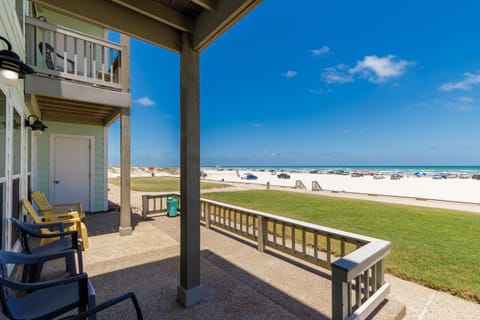 Beachfront property with direct access to pristine sandy shores and turquoise waters.