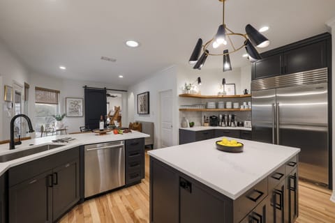 Open kitchen makes conversations between rooms very easy.