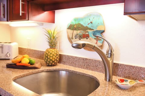 Kitchen Details - Silstone quartz counter tops and everything you need for cooking and serving delicious meals.