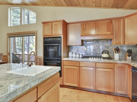 chef kitchen - with gas stove top - center island for serving or prep