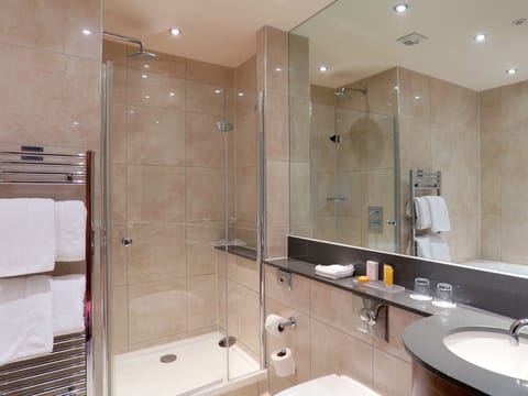 Combined shower/tub, hair dryer, towels, soap