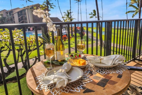 Relax and unwind on your spacious lanai with pool and ocean views.