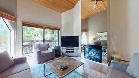 Gather around the gas fireplace in this inviting and open-concept living room.