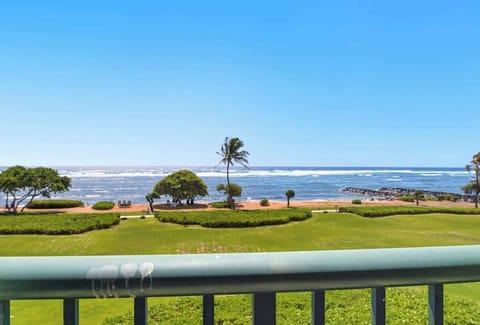 Oceanfront lanai with endless Pacific views, golf greens & swaying palms