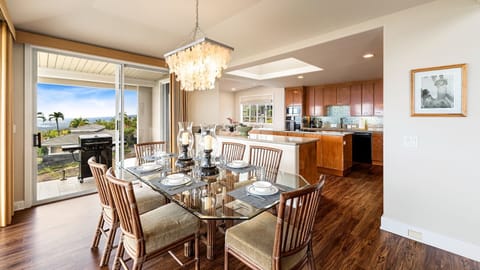 Elegant dining room upstairs adjacent to kitchen and lanai