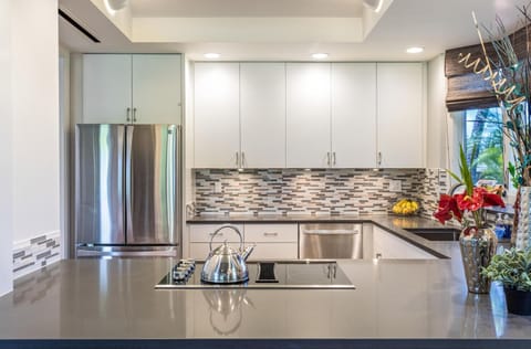 Kitchen with Refrigerator, Cooktop, and Dishwasher