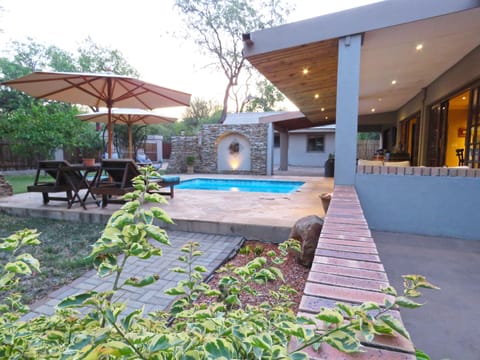 Outdoor pool, open 7:00 AM to 8:00 PM, pool umbrellas, sun loungers