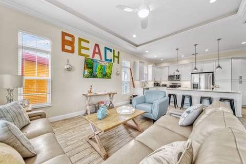 From the living room, enjoy the view back to your sleek kitchen—open flow that keeps everyone connected.