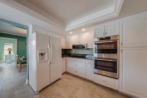 Step into a kitchen alive with possibility—where gleaming appliances invite you to craft everything from sunrise smoothies to indulgent dinners.