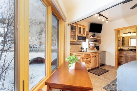 Spacious studio Apartment/fourth bedroom(100B) features views of the river, and offers kitchenette and full bathroom.