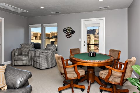 Game Table - The Game Table is set up with poker chips and cards and is perfect for playing games and adding a little competition during your stay