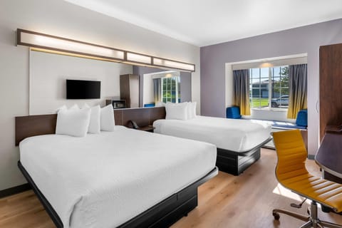 Room, 2 Queen Beds, Non Smoking (Pet Friendly) | Desk, free cribs/infant beds, free WiFi, bed sheets