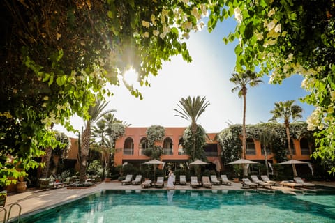 Indoor pool, outdoor pool, pool umbrellas, sun loungers