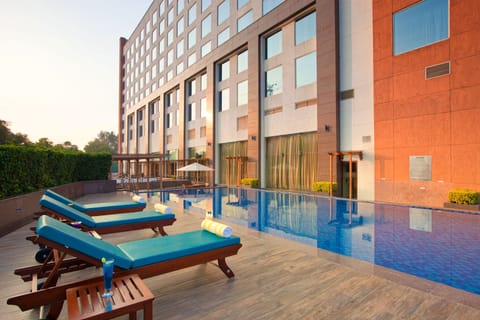 Outdoor pool, open 9:00 AM to 6:00 PM, sun loungers