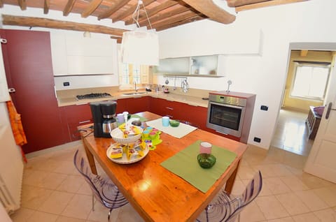 Furniture, Interior Design, Flooring, Wood, Floor, Kitchen, Countertop, Room, Ceiling, Table