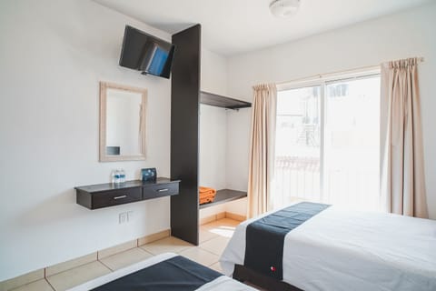 Standard Room, 2 Double Beds | WiFi (free), bed sheets