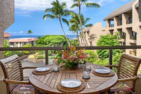 This 1-bedroom, 2-bathroom Kailua-Kona vacation rental offers stunning ocean views, island-inspired décor, and the perfect location