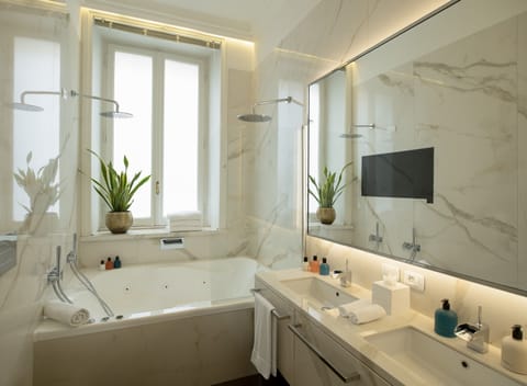 Corner Spa Suite | Bathroom | Rainfall showerhead, designer toiletries, hair dryer, bathrobes