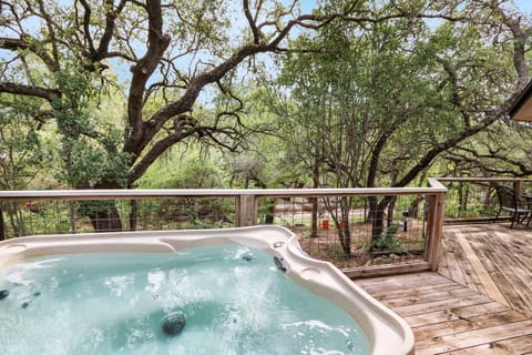 Enjoy a relaxing evening in the hot tub overlooking the creek