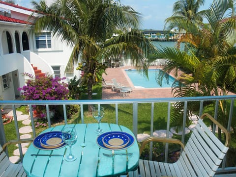 Enjoy breakfast on the balcony overlooking the pool and lovely 
inland waterway
