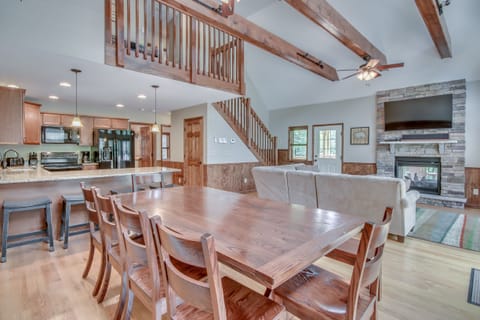 Great Room with TV, Fireplace, and Seating in our Poconos Vacation Rental Home