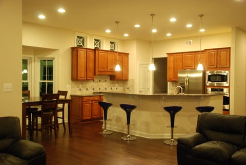 Dinette, stainless appliances and a bar area for morning breakfast.