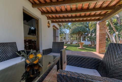 Chairs and tables of El Palmeral and Los Naranjos country houses Terrace in Hacienda Roche Viejo in Conil