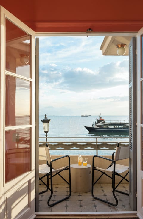 Enjoy your drink on the balcony overlooking the sea view