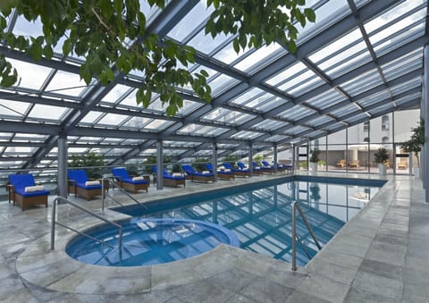 Indoor pool, open 11:00 AM to 8:00 PM, pool umbrellas