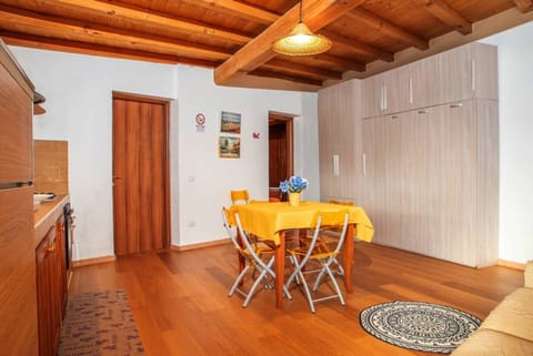 Property, Furniture, Table, Wood, Interior Design, Orange, Window, Cabinetry, Floor, Flooring