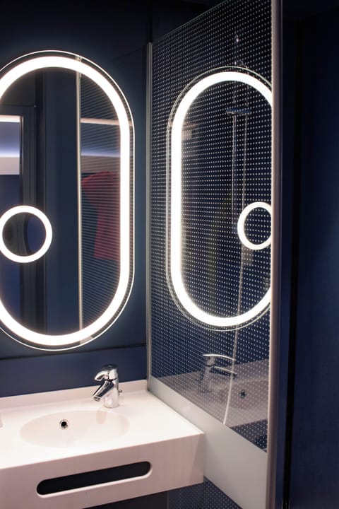 Shower, eco-friendly toiletries, hair dryer, towels