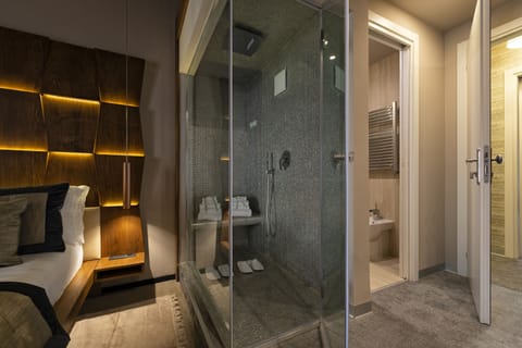 Superior Room | Bathroom | Designer toiletries, hair dryer, slippers, towels