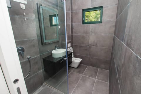 Double Room, Balcony, Garden View | Bathroom | Shower, free toiletries, hair dryer, bathrobes