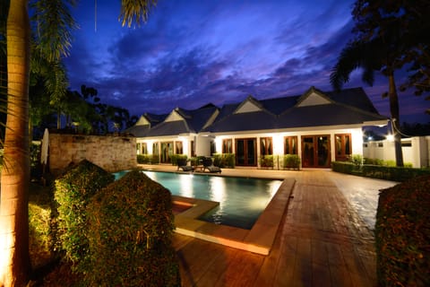Outdoor pool, a waterfall pool, open 9:00 AM to 10:00 PM, pool umbrellas
