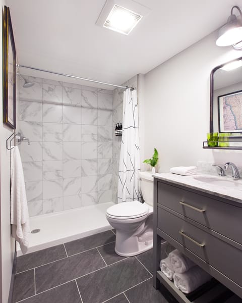 Designer toiletries, hair dryer, towels, soap