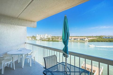 Sip your morning coffee on this private waterfront balcony, watching boats glide past turquoise waters.