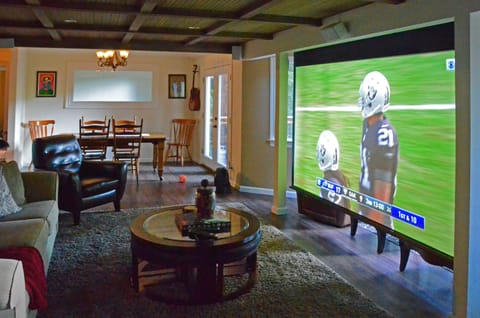 The Grove's home theater for watching sports and movies - big screen living!