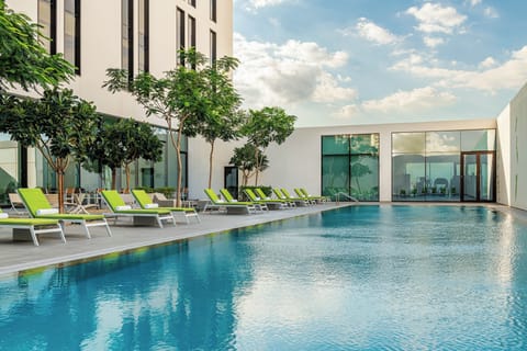 Outdoor pool, pool umbrellas, sun loungers