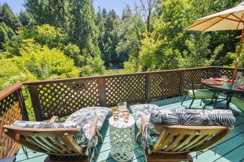 Enjoy sunny days on the deck overlooking the large backyard!